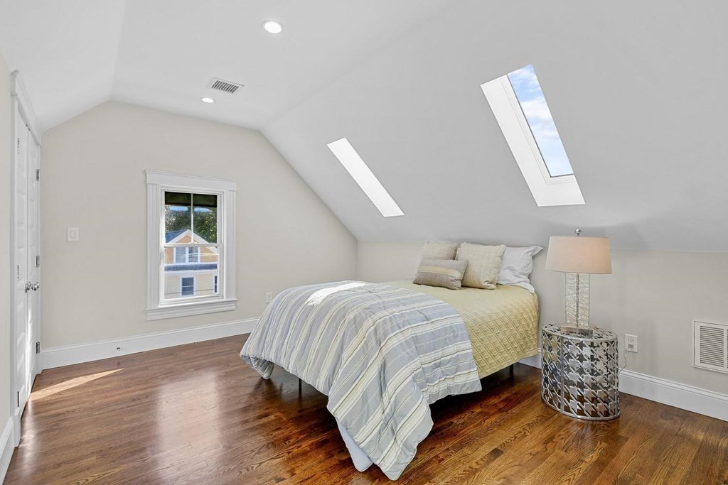 151 Beaver Street, Unit 2 Boston, MA 02136 - Photo 12 of 20 a bedroom with bed and window