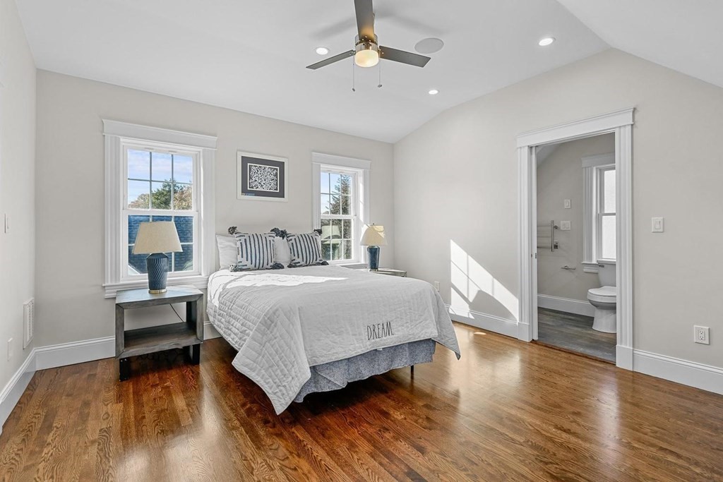 151 Beaver Street, Unit 2 Boston, MA 02136 - Photo 13 of 20 a bedroom with a bed and wooden floor