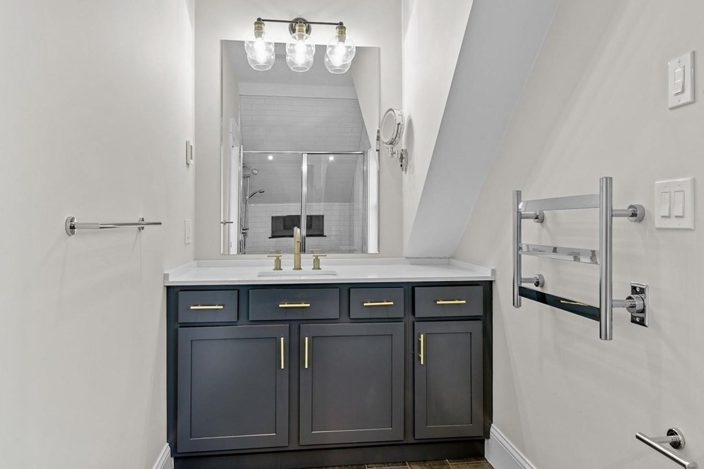 151 Beaver Street, Unit 2 Boston, MA 02136 - Photo 14 of 20 a view of cabinets a sink and dishwasher in a kitchen