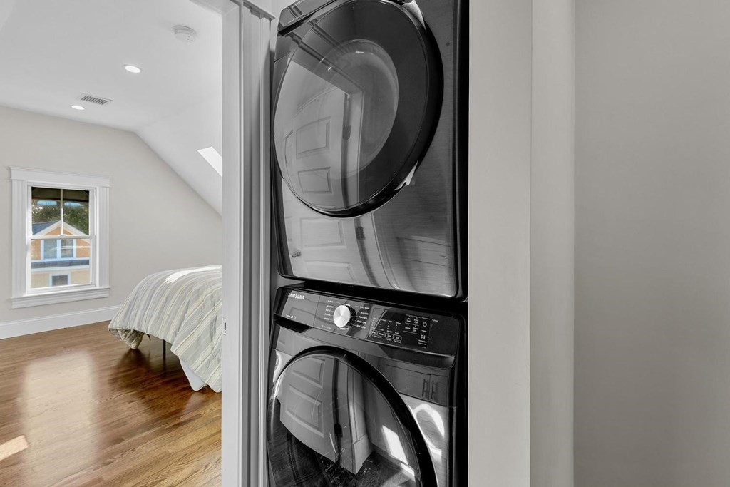 151 Beaver Street, Unit 2 Boston, MA 02136 - Photo 16 of 20 a view of a bedroom with washer and dryer