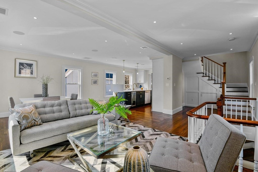 151 Beaver Street, Unit 2 Boston, MA 02136 - Photo 4 of 20 a living room with furniture kitchen view and a table