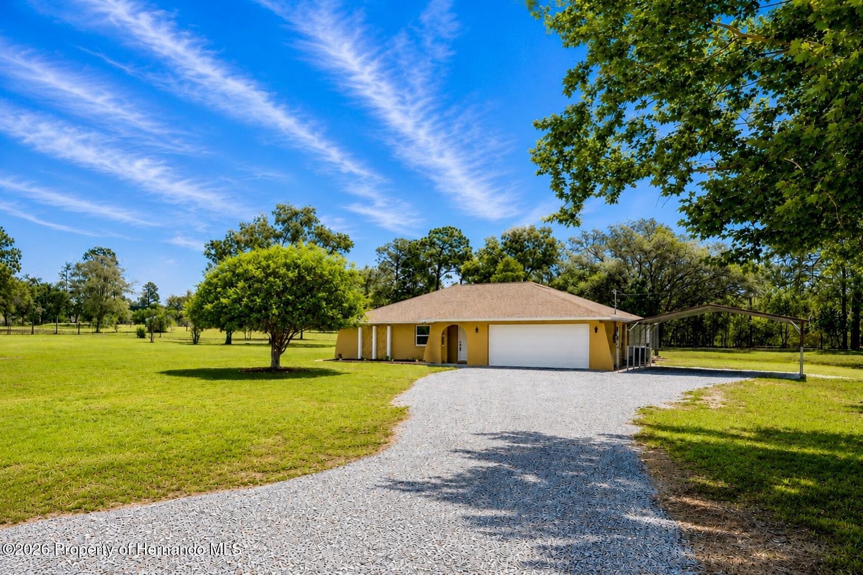 9086 Grove Road Spring Hill, FL 34613 - Photo 1 of 30 Gallery Image 1