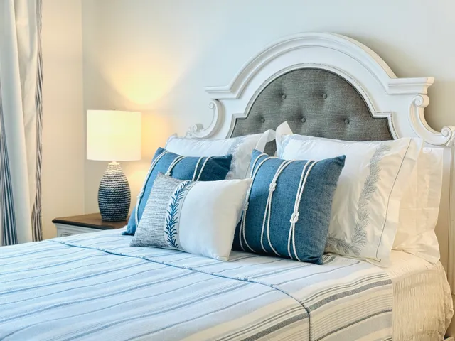 a living room with furniture flowerpot and a potted plant