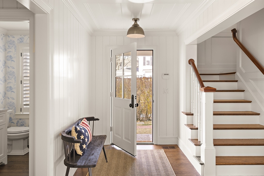 114 North Water Street Edgartown, MA 02539 - Photo 17 of 42 a view of a hallway with wooden floor and workspace