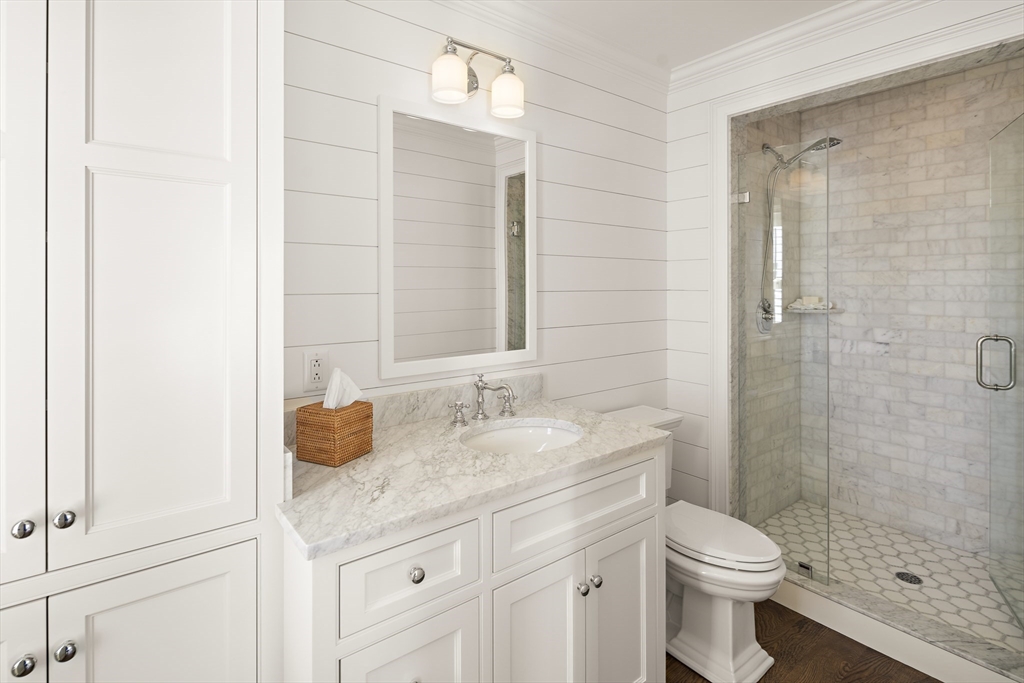 114 North Water Street Edgartown, MA 02539 - Photo 22 of 42 a bathroom with a granite countertop sink a toilet and shower