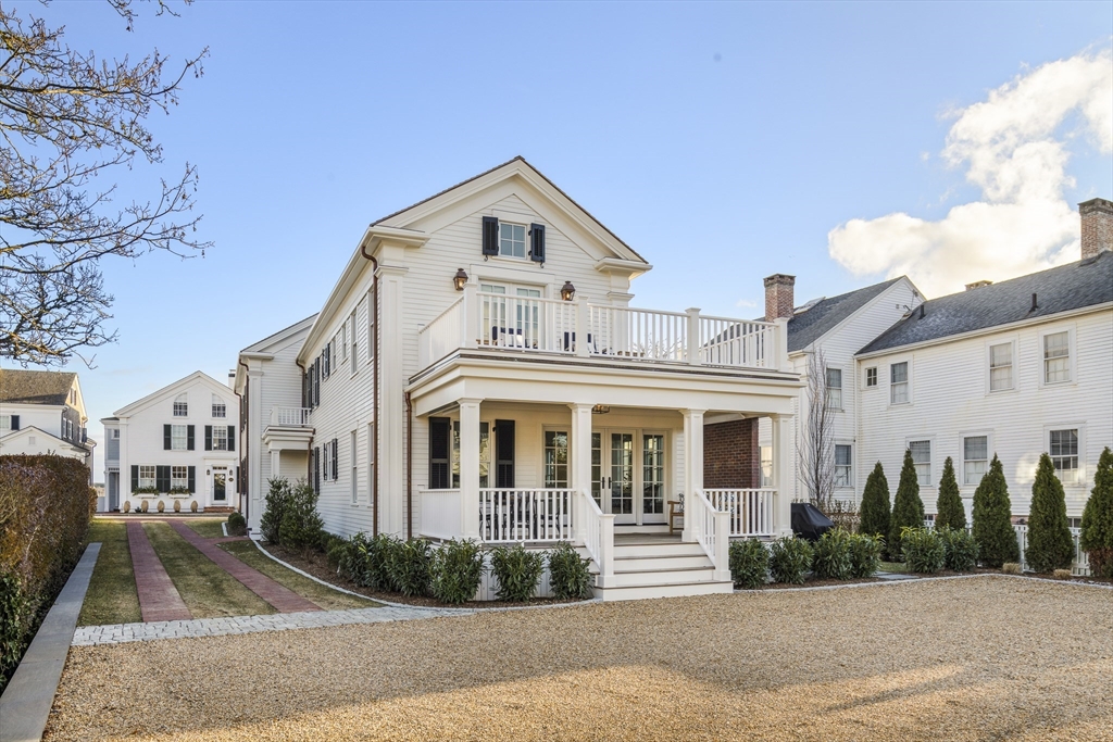 114 North Water Street Edgartown, MA 02539 - Photo 33 of 42 a front view of a house with a yard
