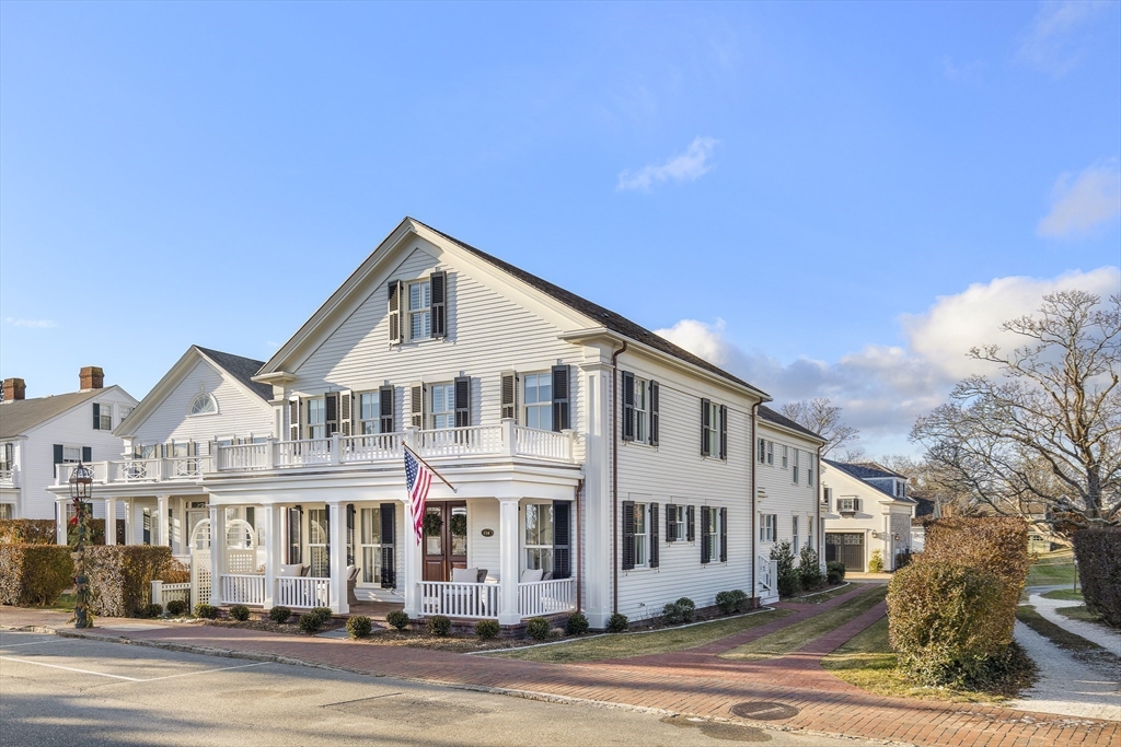 114 North Water Street Edgartown, MA 02539 - Photo 4 of 42 a front view of a residential houses with yard and road