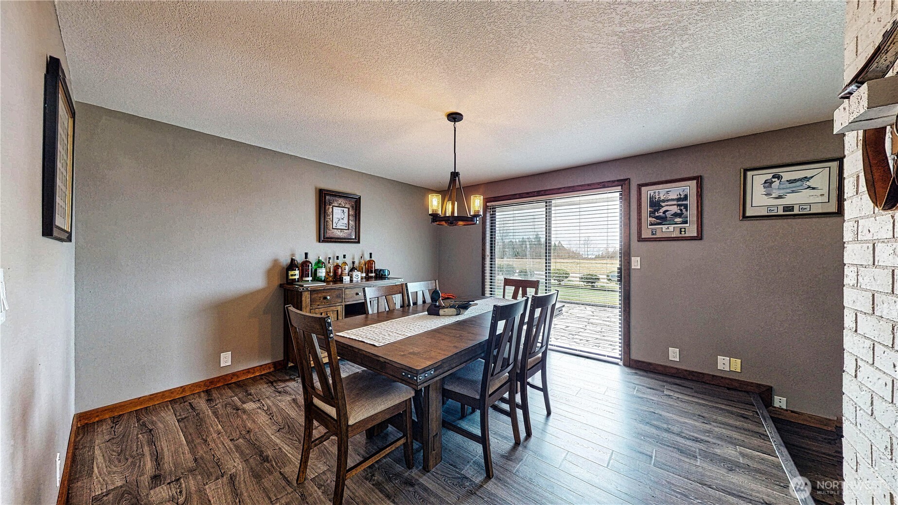 22128 Bulson Road Mount Vernon, WA 98274 - Photo 16 of 39 a view of a dining room with furniture window and wooden floor