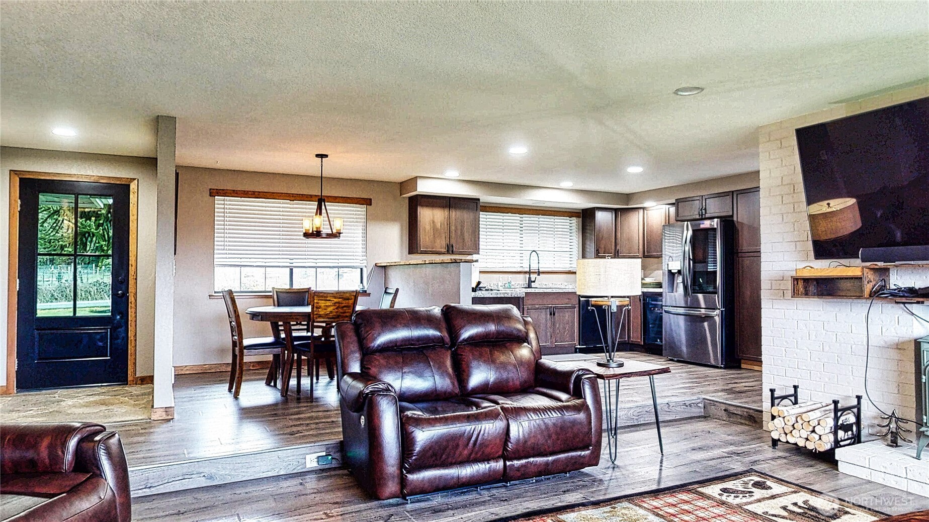 22128 Bulson Road Mount Vernon, WA 98274 - Photo 17 of 39 a living room with stainless steel appliances kitchen island granite countertop furniture and a kitchen view