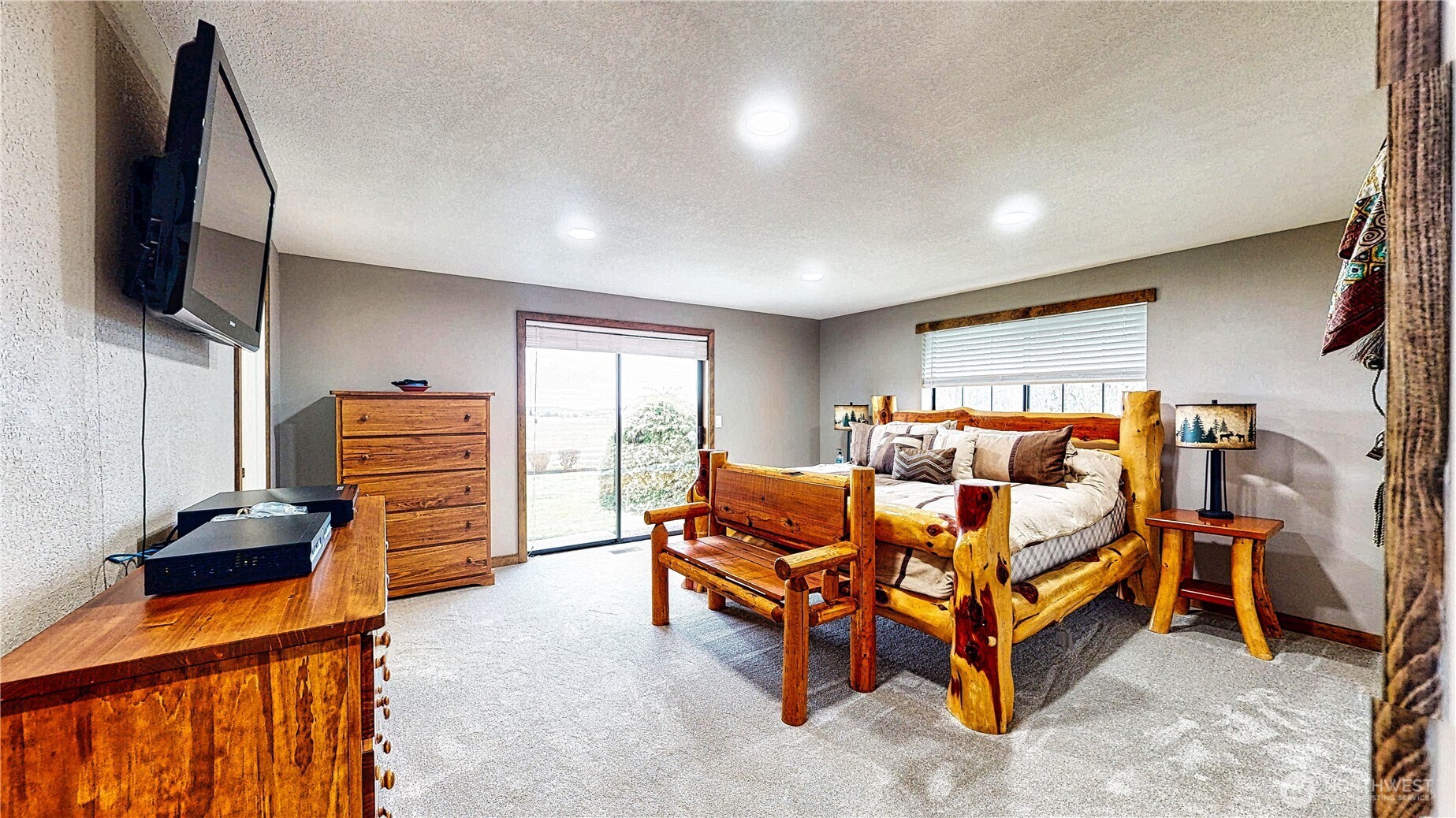 22128 Bulson Road Mount Vernon, WA 98274 - Photo 24 of 39 a bedroom with furniture and a flat screen tv