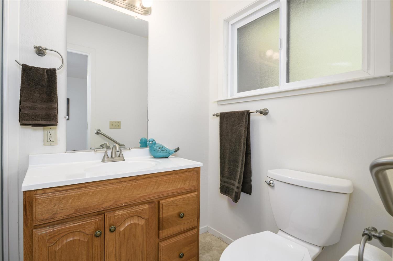 3166 Cedar Ravine Road Placerville, CA 95667 - Photo 12 of 29 a bathroom with a sink vanity mirror and toilet