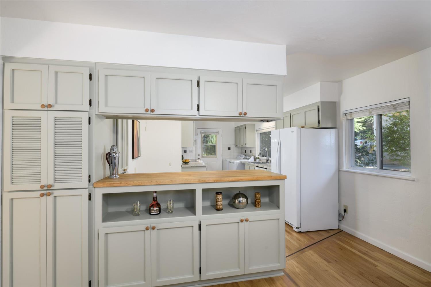 3166 Cedar Ravine Road Placerville, CA 95667 - Photo 9 of 29 a kitchen with stainless steel appliances granite countertop a refrigerator and a stove top oven