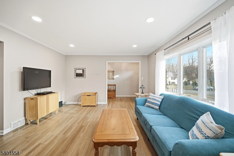 58 Dogwood Road Morristown, NJ 07960 - Photo 16 of 44 a living room with furniture and a flat screen tv