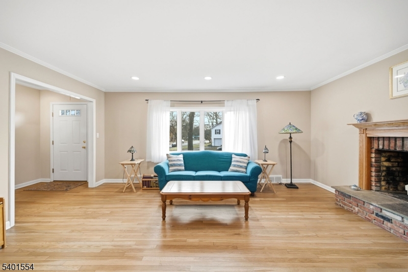 58 Dogwood Road Morristown, NJ 07960 - Photo 18 of 44 a living room with furniture and a fireplace