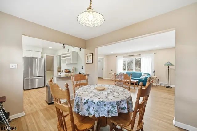 a bedroom with a bed and a table