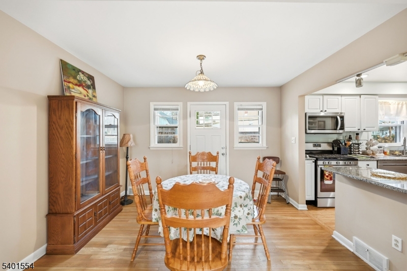 58 Dogwood Road Morristown, NJ 07960 - Photo 21 of 44 a view of a dining room with furniture window and wooden floor