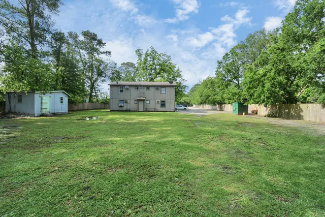 a house view with a garden space