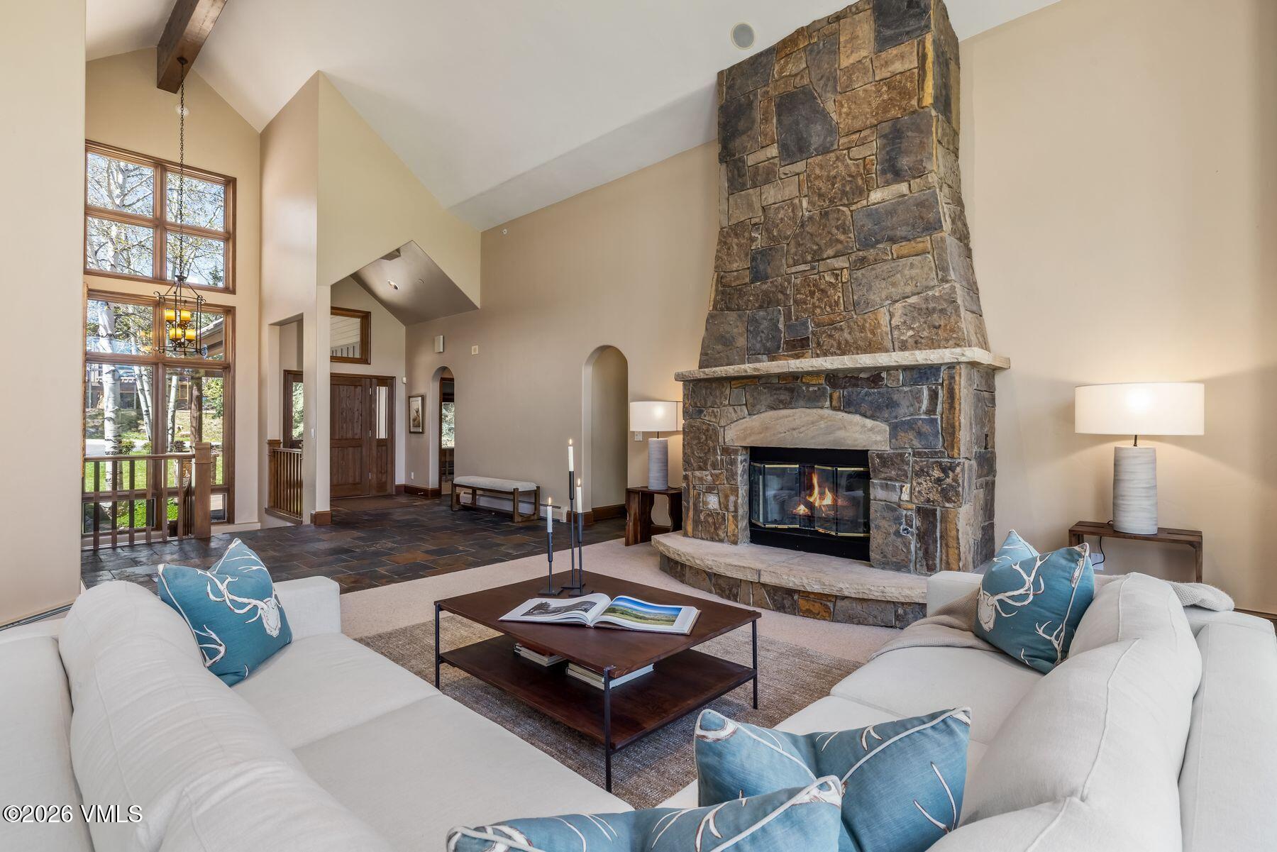 167 Saddle Ridge Edwards, CO 81632 - Photo 8 of 41 a living room with furniture and a fireplace