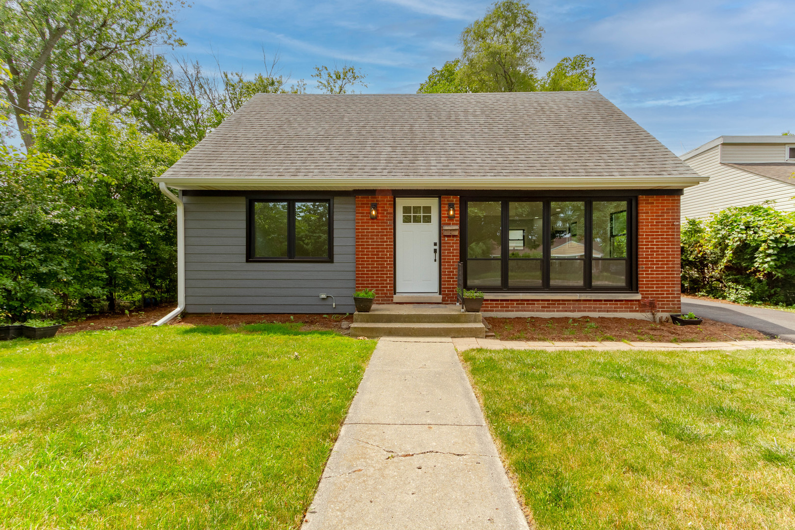 7015 Palma Lane Morton Grove, IL 60053 - Photo 1 of 19 a view of swimming pool with a garden