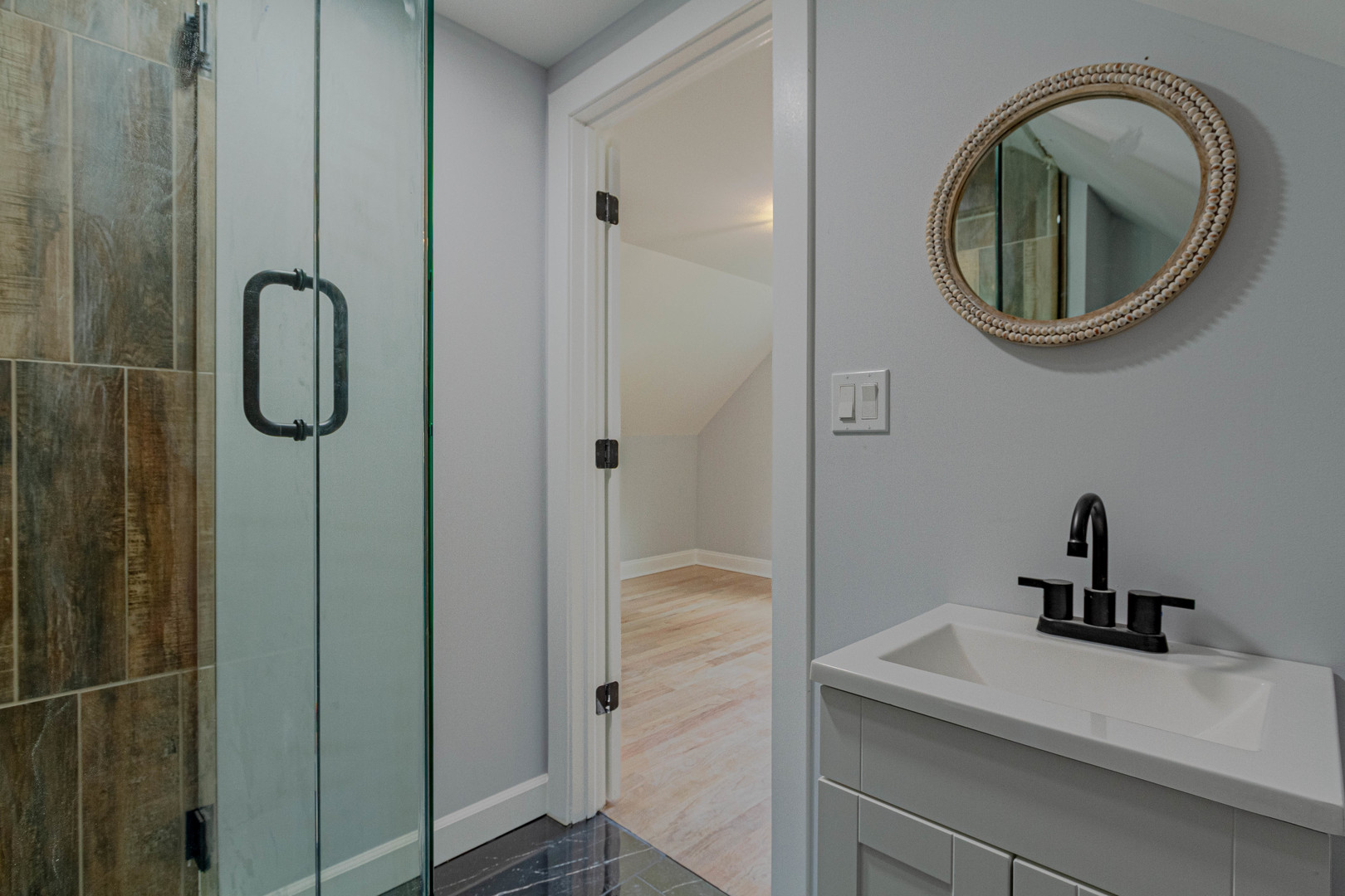 7015 Palma Lane Morton Grove, IL 60053 - Photo 17 of 19 a bathroom with a sink a vanity and shower