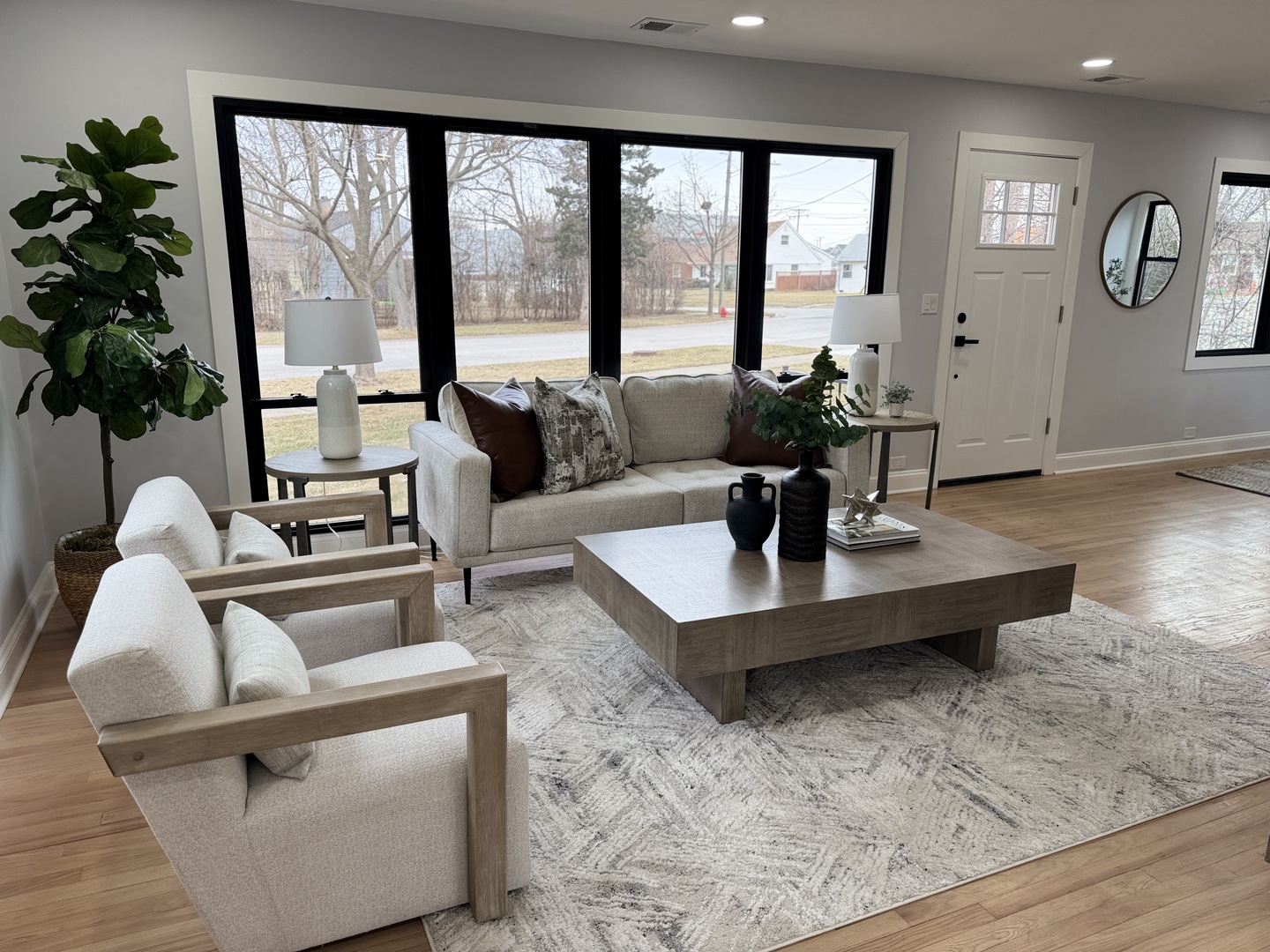7015 Palma Lane Morton Grove, IL 60053 - Photo 6 of 19 a living room with furniture and large windows