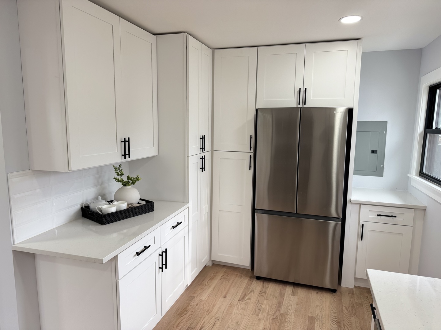 7015 Palma Lane Morton Grove, IL 60053 - Photo 10 of 19 a kitchen with stainless steel appliances a refrigerator sink and wooden floor