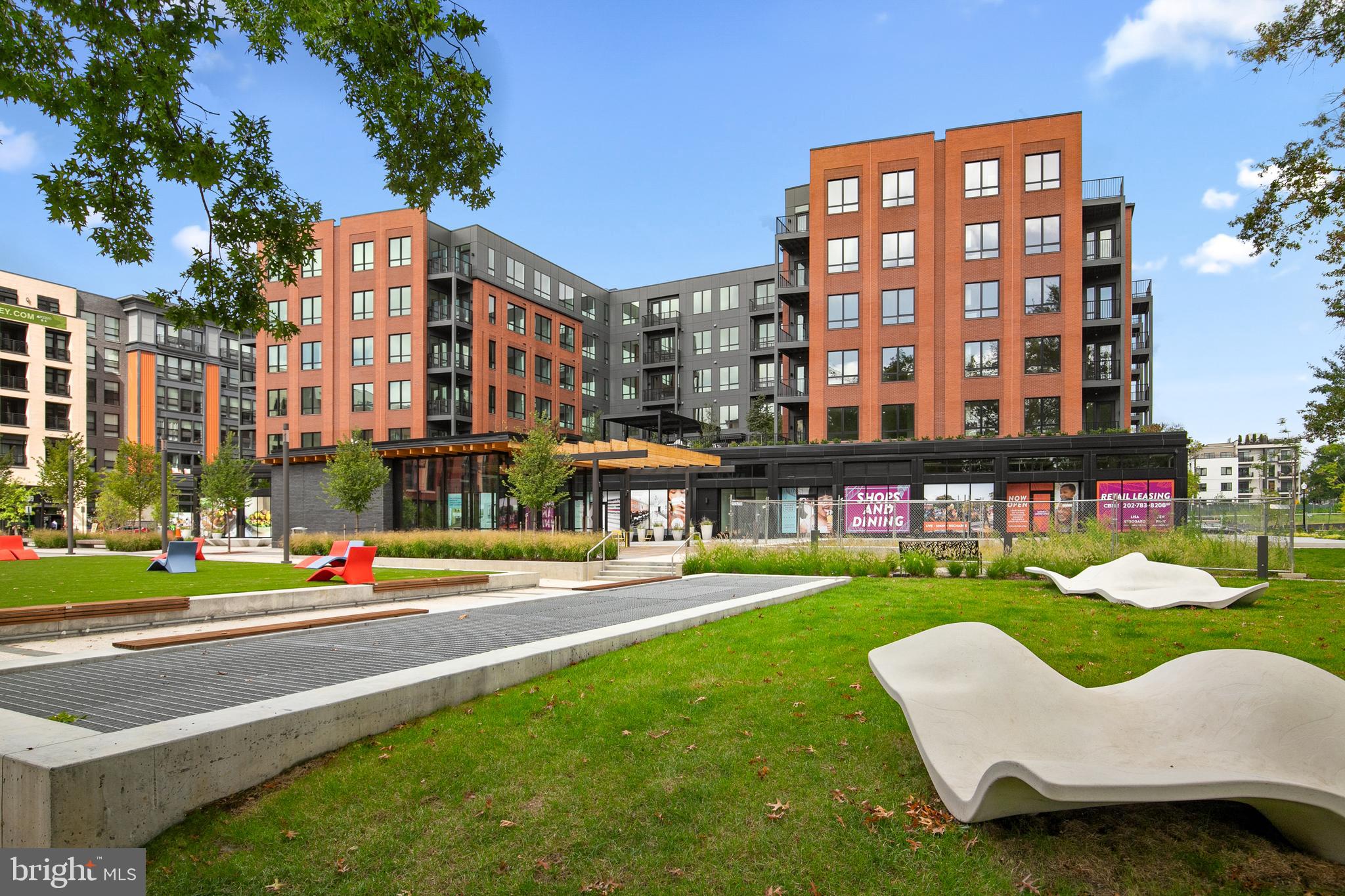 7175 12th Street Northwest, Unit 621 Washington, DC 20012 - Photo 11 of 31 a city view with tall buildings and a yard