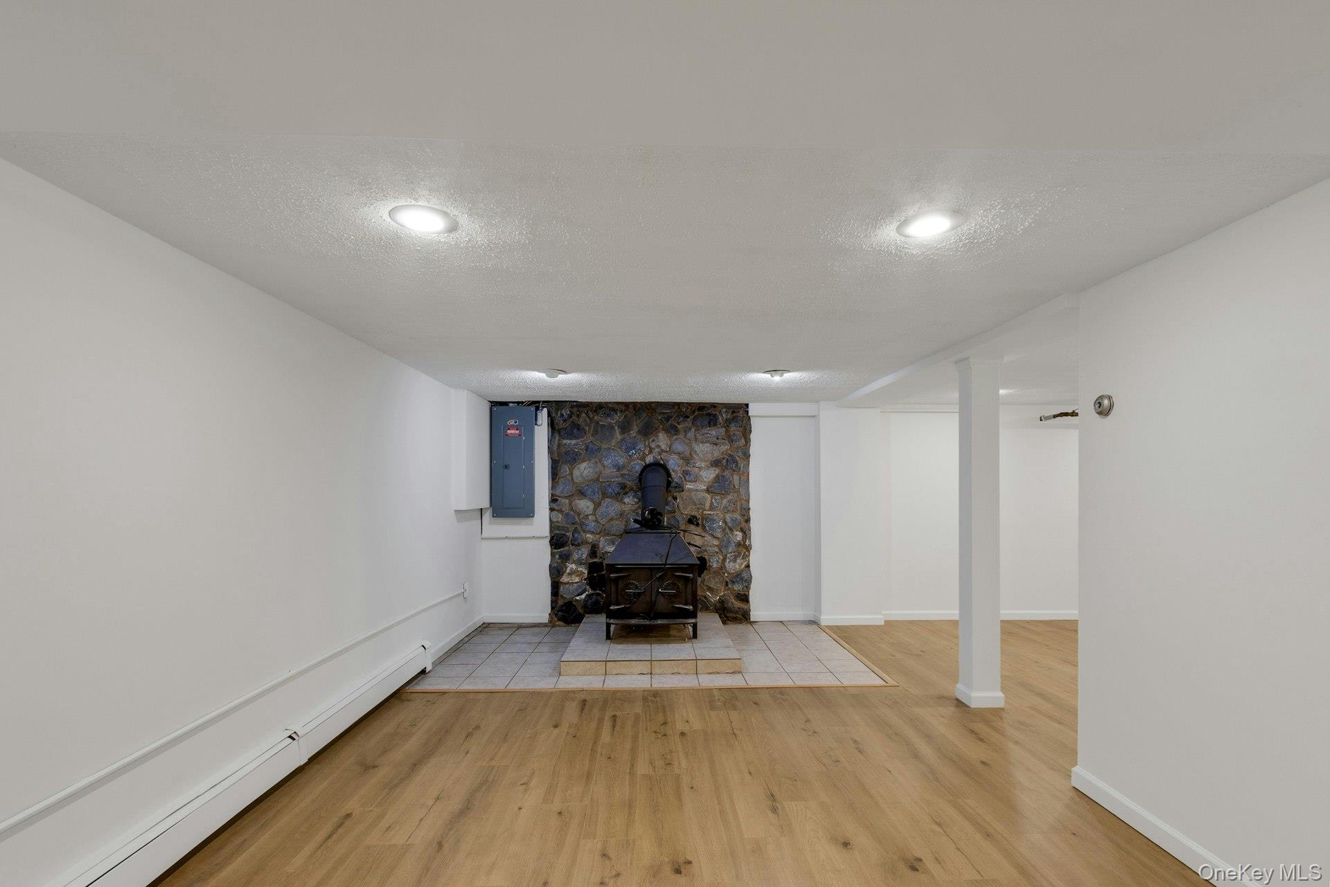 3 Ritter Drive Poughkeepsie, NY 12601 - Photo 32 of 49 Basement with wood burning stove