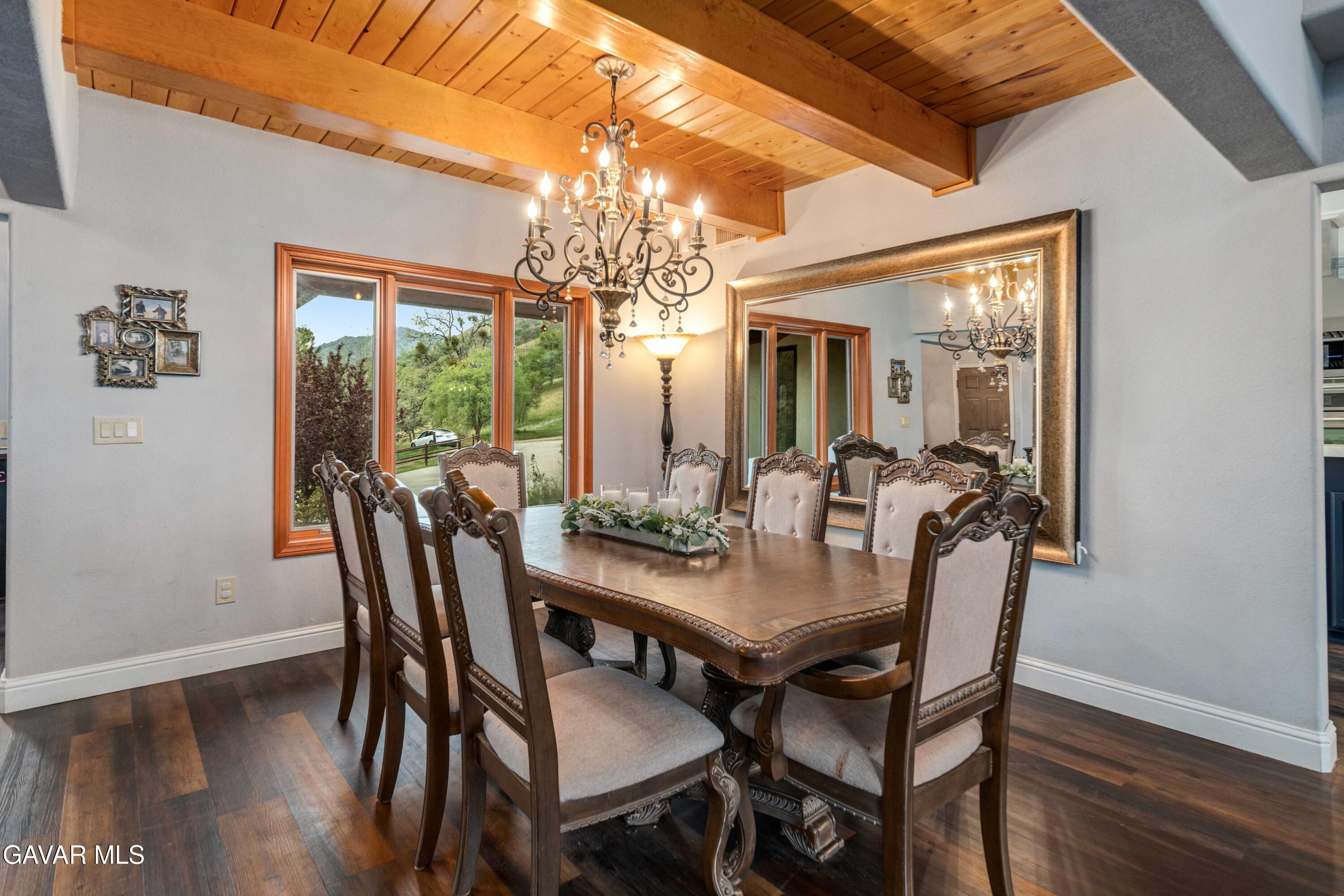 23800 Bertram Circle Tehachapi, CA 93561 - Photo 13 of 85 a view of a dining room with furniture window and wooden floor