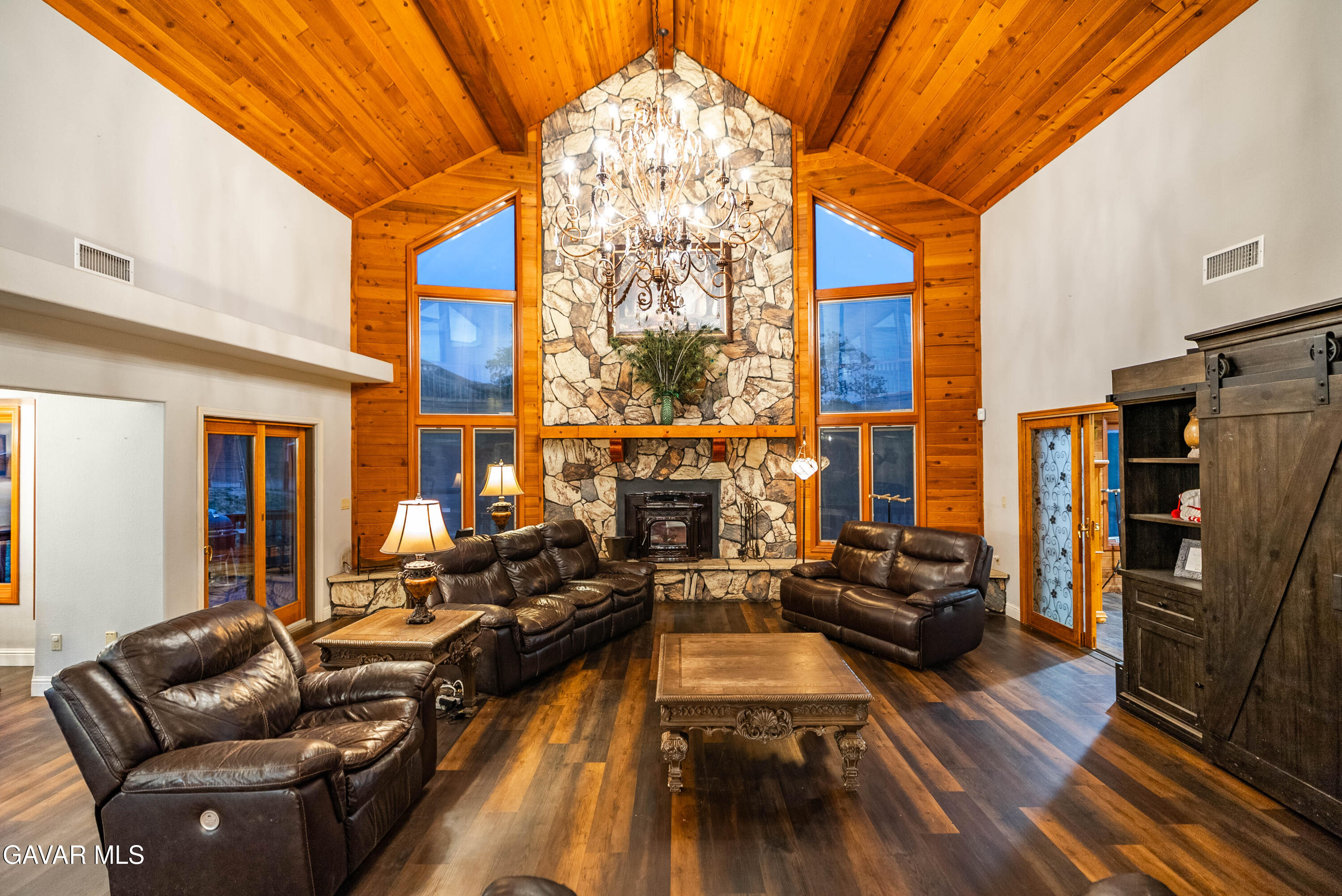 23800 Bertram Circle Tehachapi, CA 93561 - Photo 15 of 85 a living room with furniture fireplace and a large window