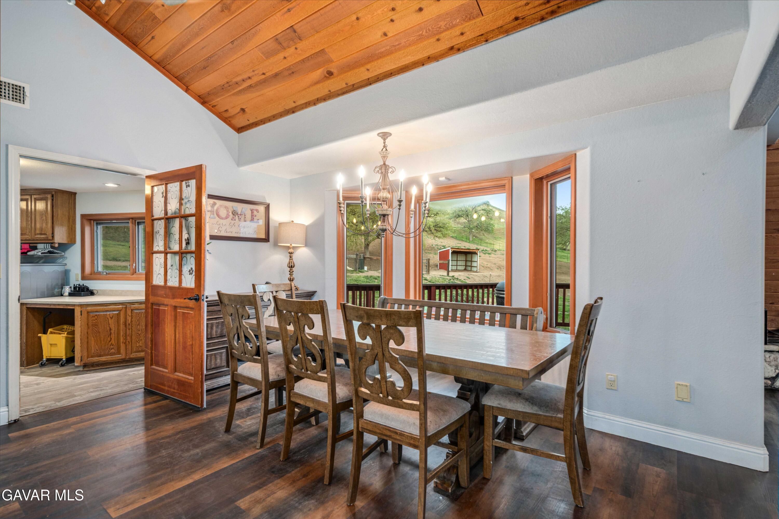 23800 Bertram Circle Tehachapi, CA 93561 - Photo 23 of 85 a view of a dining room with furniture window and wooden floor