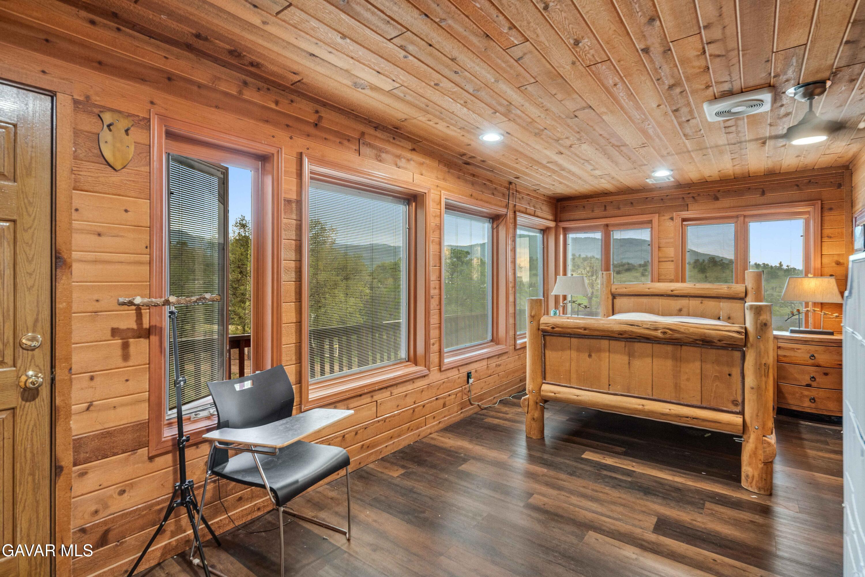 23800 Bertram Circle Tehachapi, CA 93561 - Photo 28 of 85 a bedroom with furniture and large window