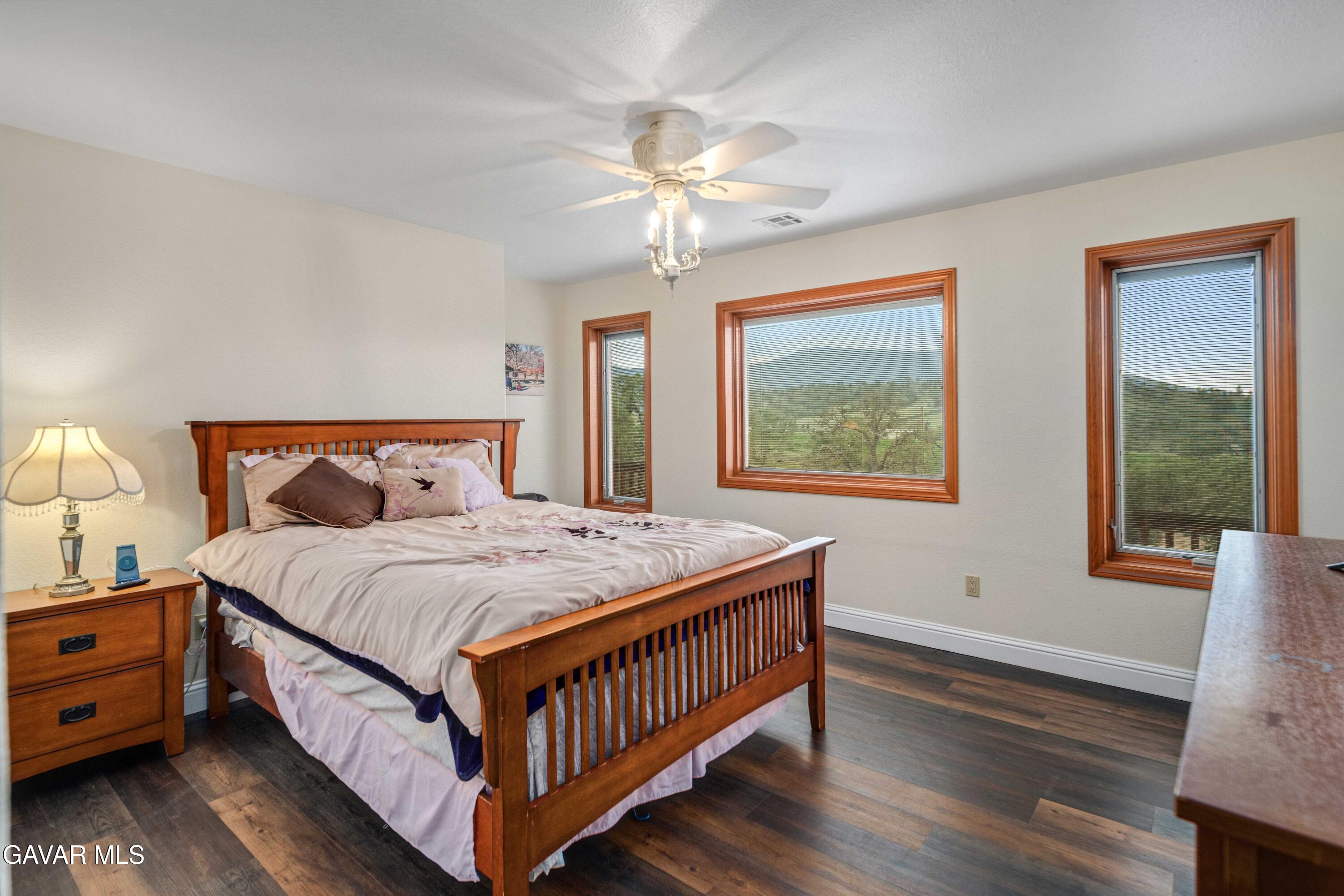 23800 Bertram Circle Tehachapi, CA 93561 - Photo 32 of 85 a bedroom with a bed and a window