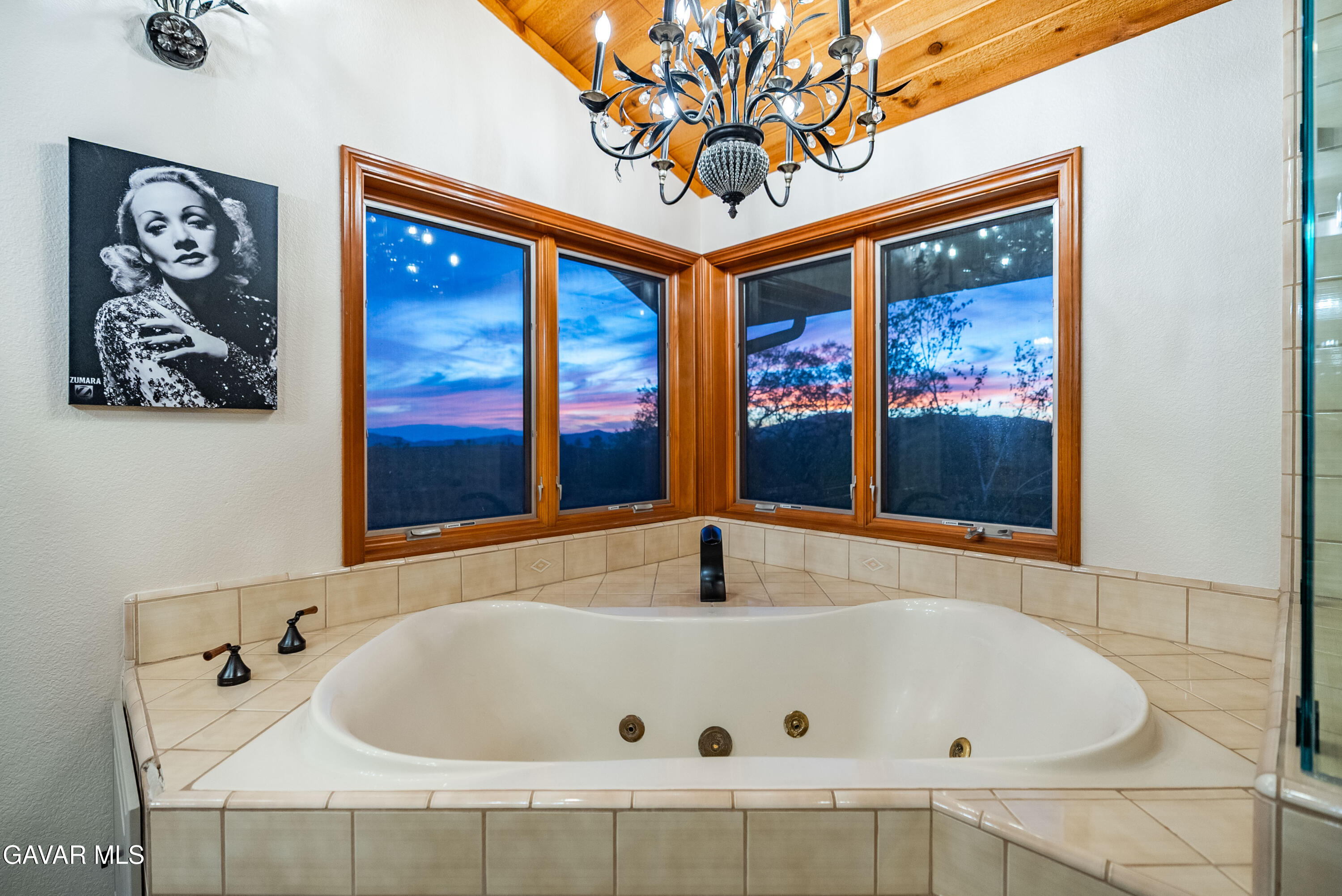 23800 Bertram Circle Tehachapi, CA 93561 - Photo 45 of 85 a white bath tub sitting in a bathroom next to a window