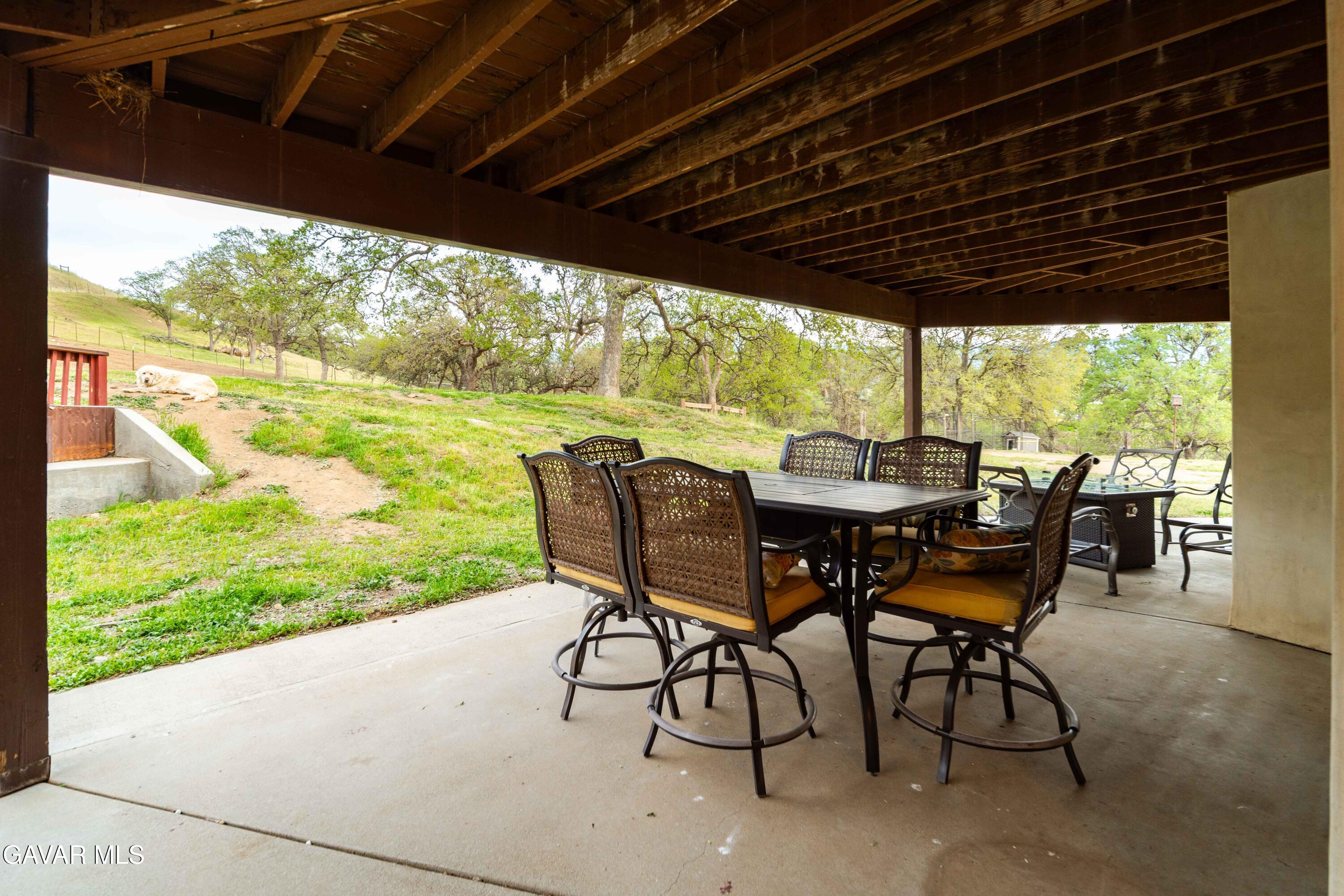 23800 Bertram Circle Tehachapi, CA 93561 - Photo 58 of 85 a view of an outdoor dining space with furniture and garden view