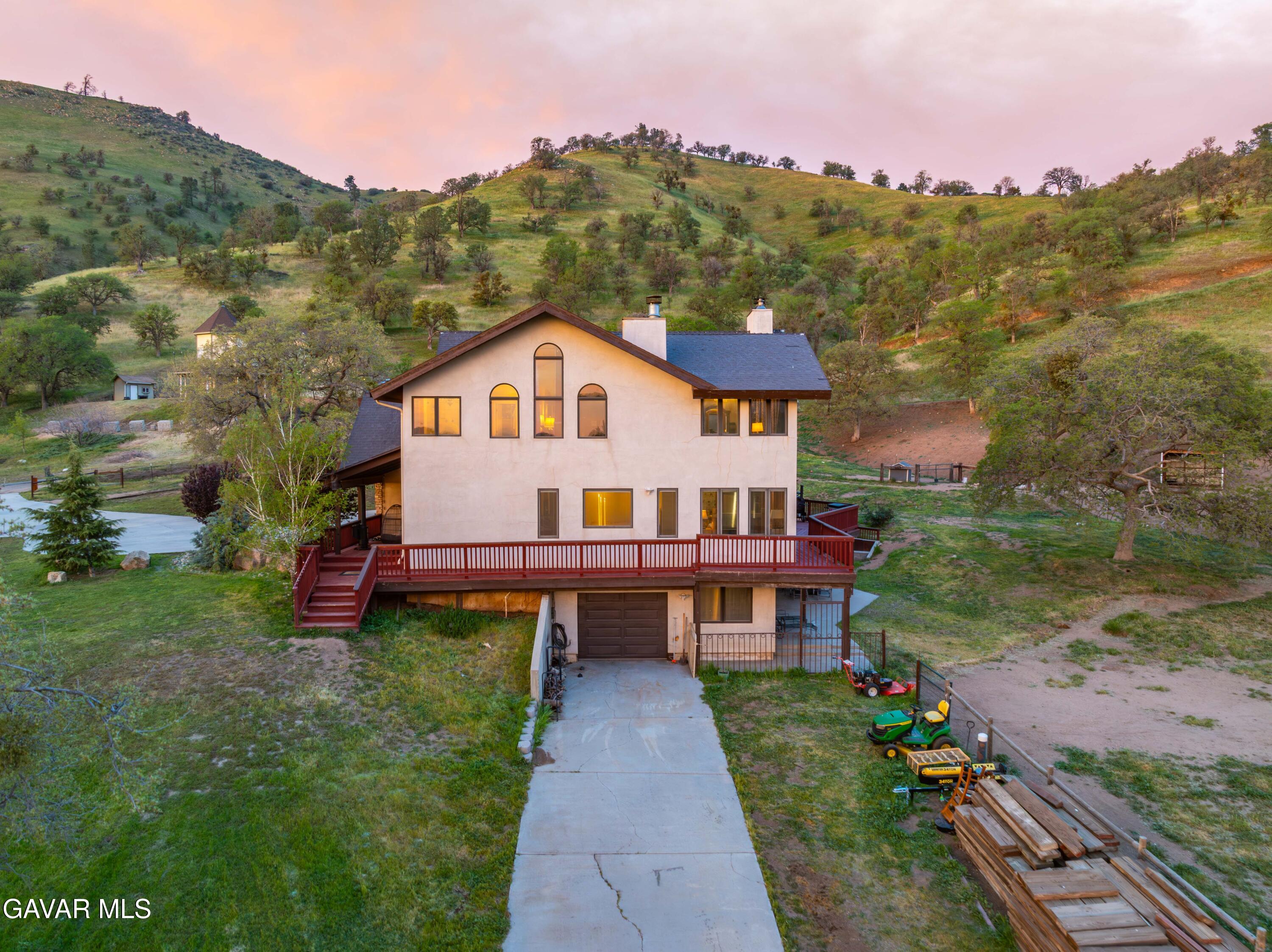 23800 Bertram Circle Tehachapi, CA 93561 - Photo 65 of 85 a view of a house with a big yard and large trees