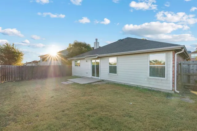 a view of backyard of house