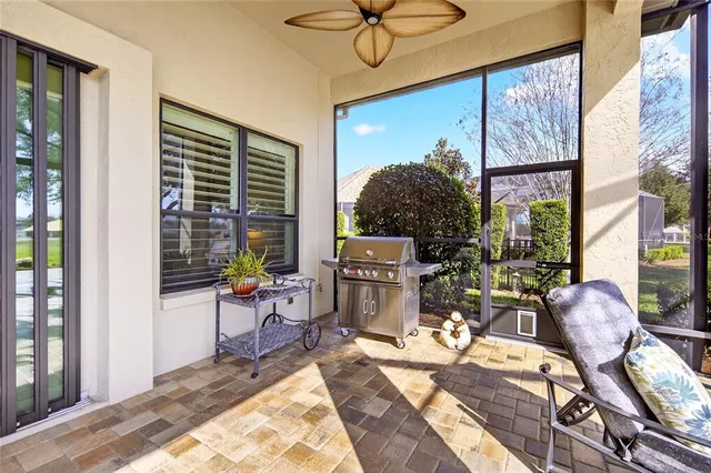 a view of swimming pool with a lounge chair
