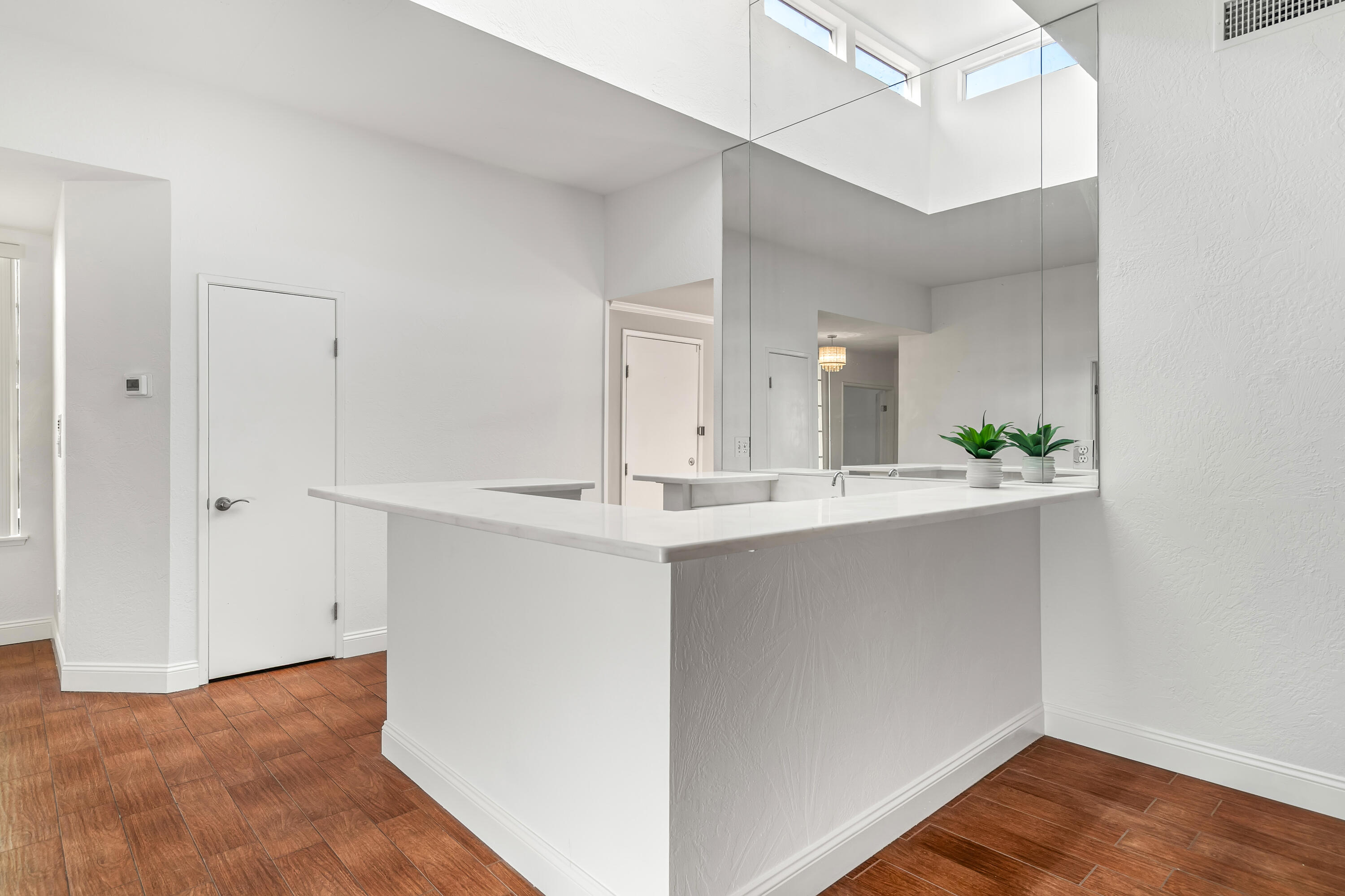 37 Santo Domingo Drive Rancho Mirage, CA 92270 - Photo 12 of 49 a view of a kitchen from the hallway