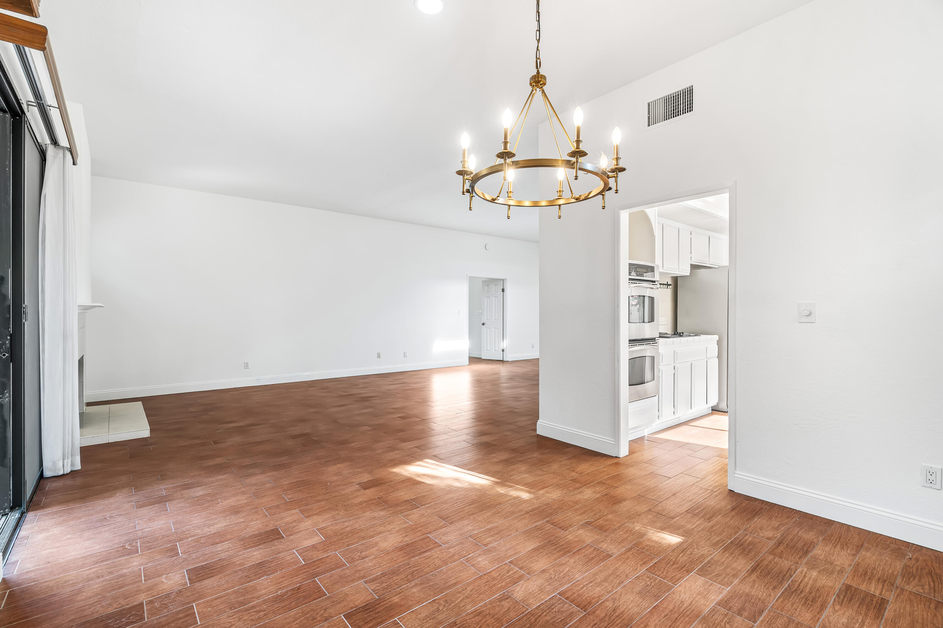 37 Santo Domingo Drive Rancho Mirage, CA 92270 - Photo 14 of 49 a view of a livingroom with a chandelier