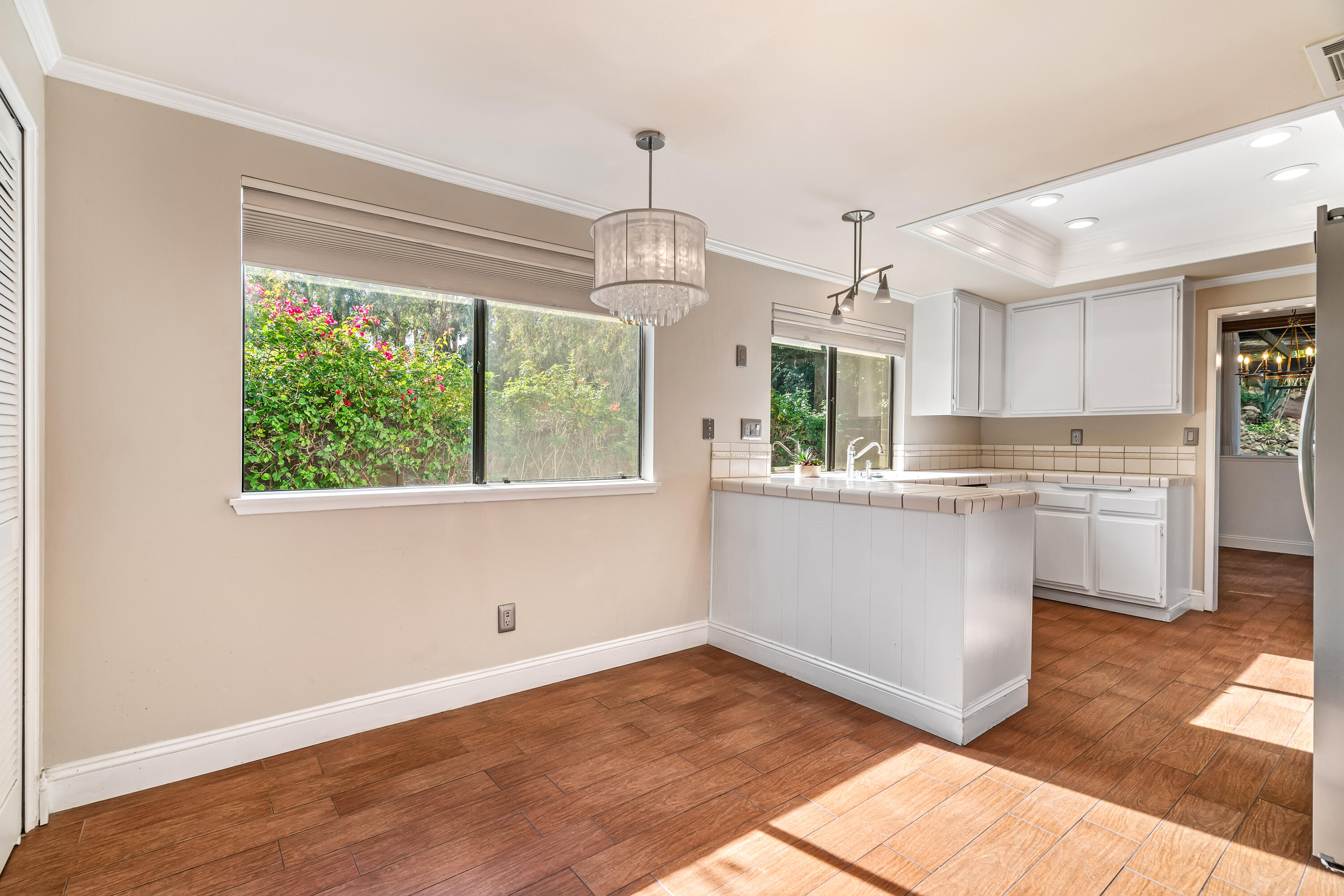 37 Santo Domingo Drive Rancho Mirage, CA 92270 - Photo 20 of 49 a kitchen with kitchen island a counter top space appliances and a window