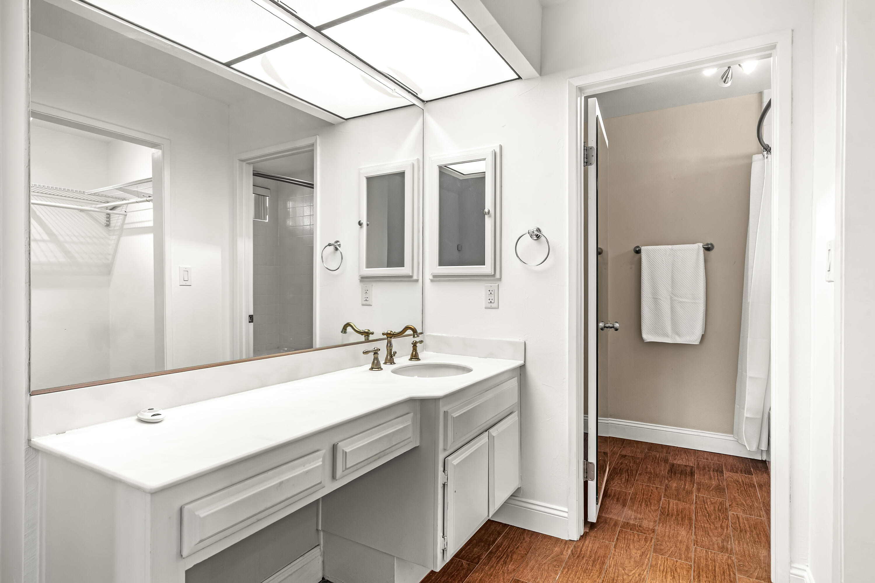 37 Santo Domingo Drive Rancho Mirage, CA 92270 - Photo 25 of 49 a bathroom with a sink a mirror and a shower