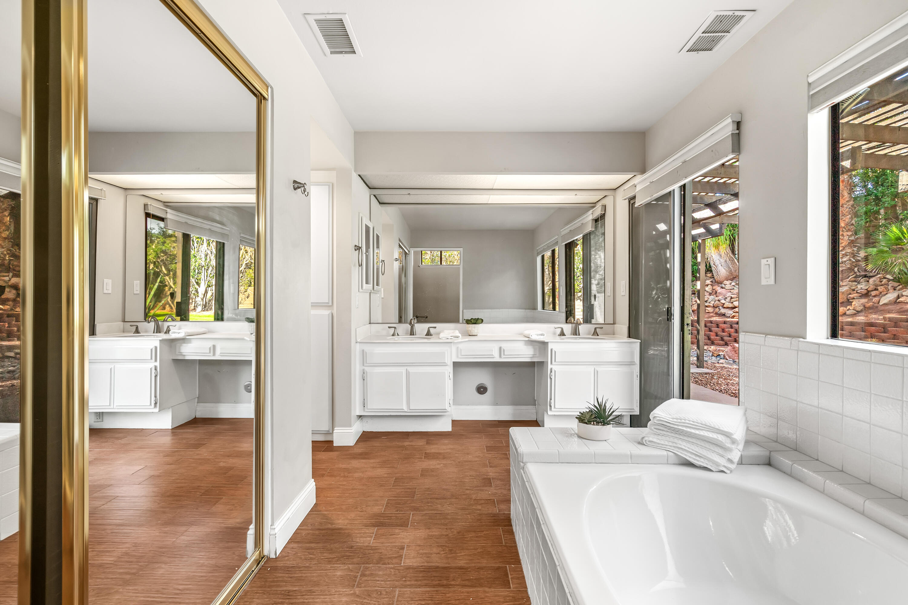 37 Santo Domingo Drive Rancho Mirage, CA 92270 - Photo 33 of 49 a large spacious bathroom with a large tub and sink
