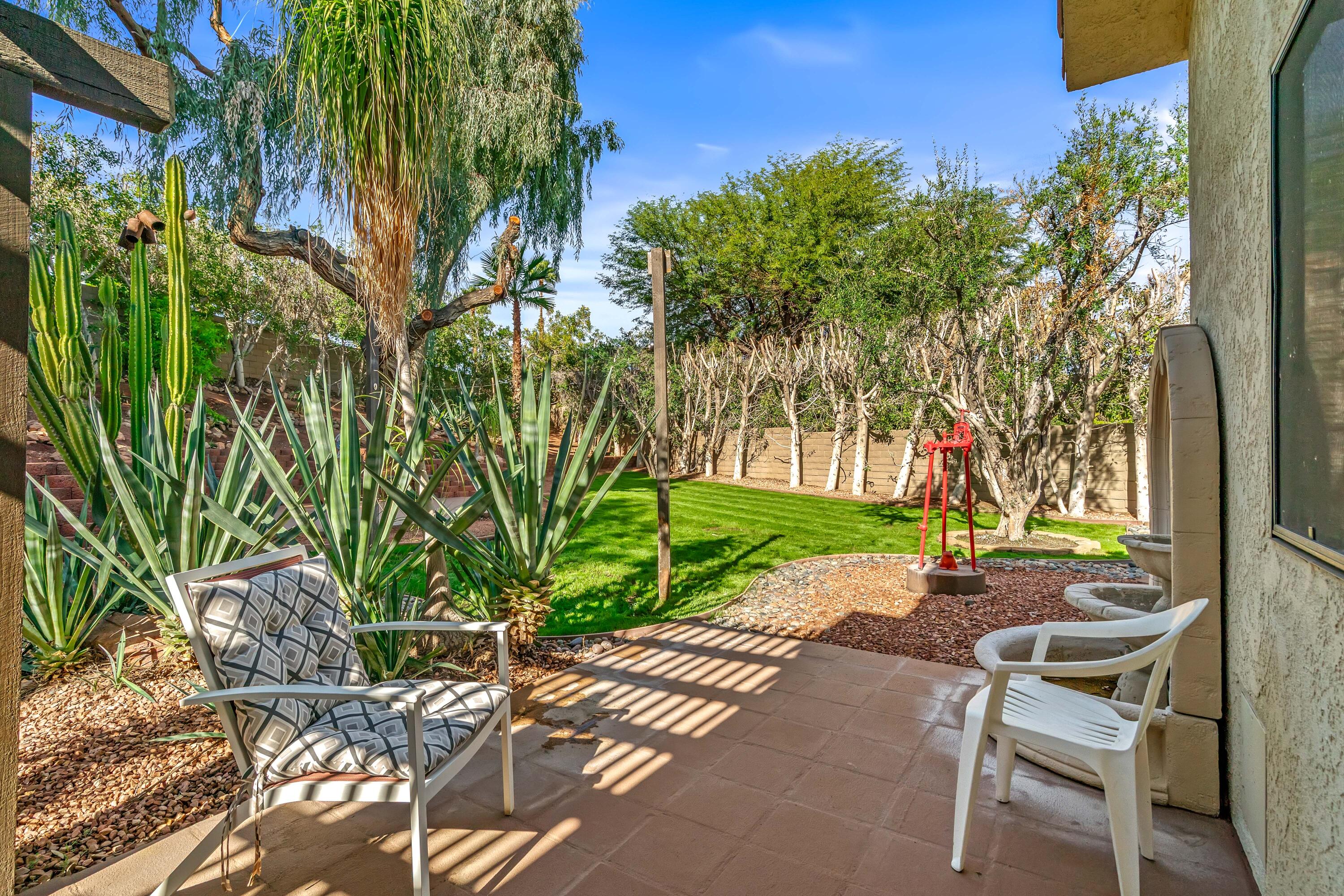37 Santo Domingo Drive Rancho Mirage, CA 92270 - Photo 43 of 49 a view of yard with seating area and trees around