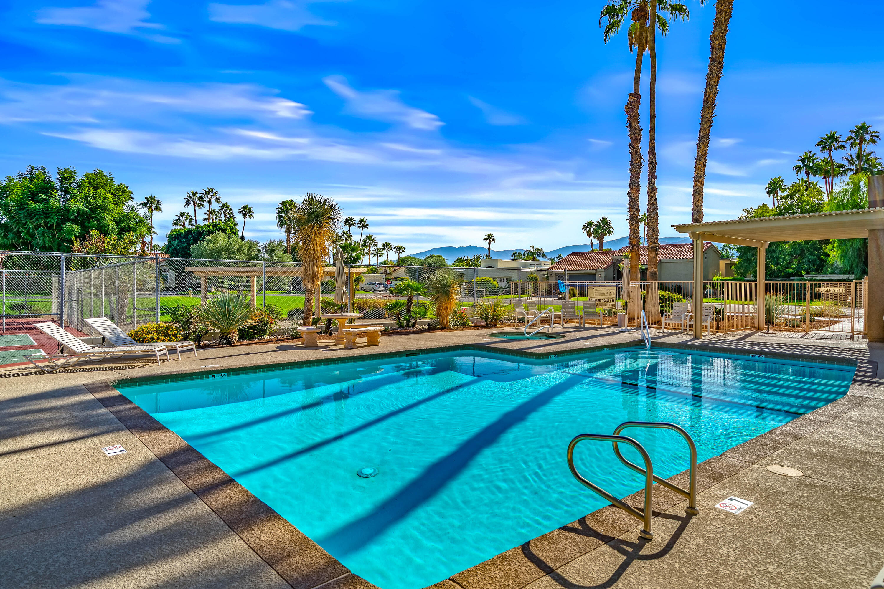 37 Santo Domingo Drive Rancho Mirage, CA 92270 - Photo 46 of 49 a view of a swimming pool with a patio