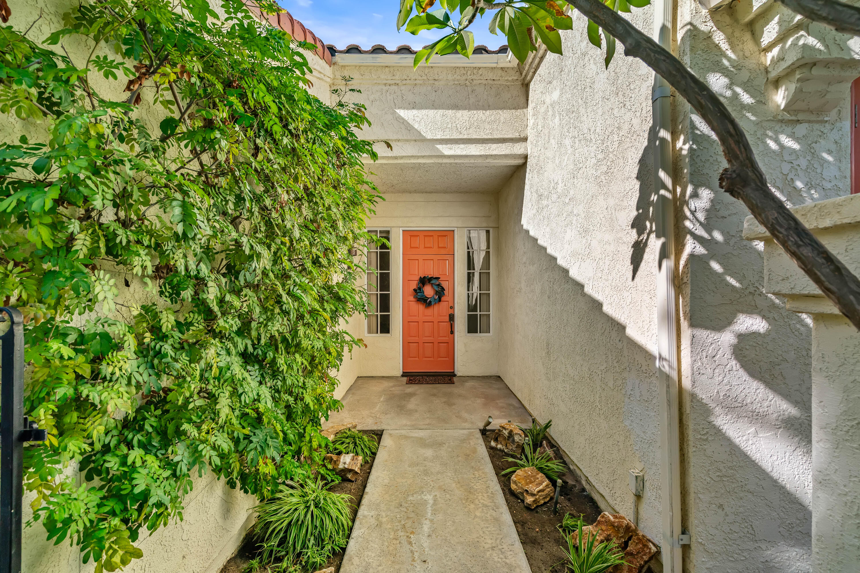 37 Santo Domingo Drive Rancho Mirage, CA 92270 - Photo 5 of 49 a view of a pathway both side of building