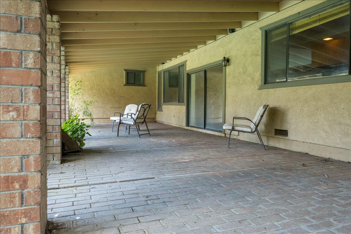 12188 Clay Station Road Herald, CA 95638 - Photo 23 of 89 Sliding doors enter into den/family room with woodstove and wet bar