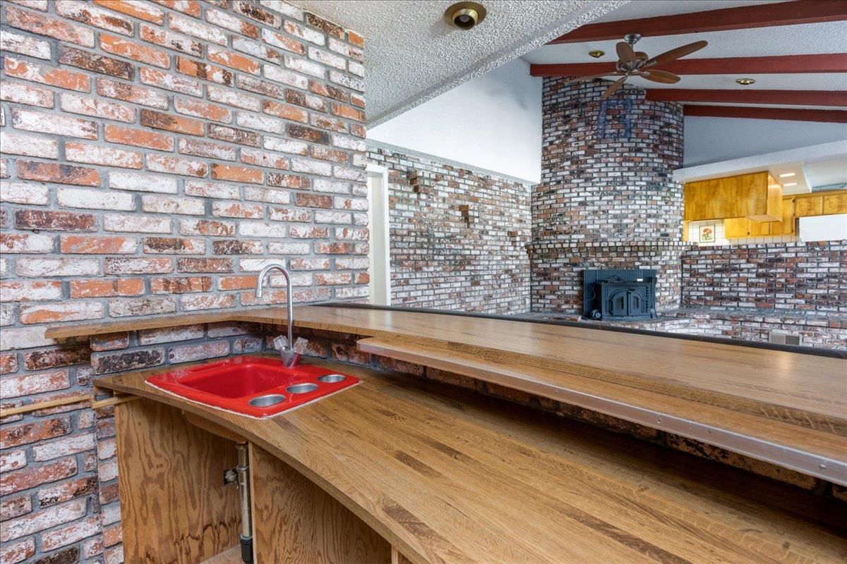 12188 Clay Station Road Herald, CA 95638 - Photo 61 of 89 Wet bar looking out into den/family room . Kitchen cabinets beyond