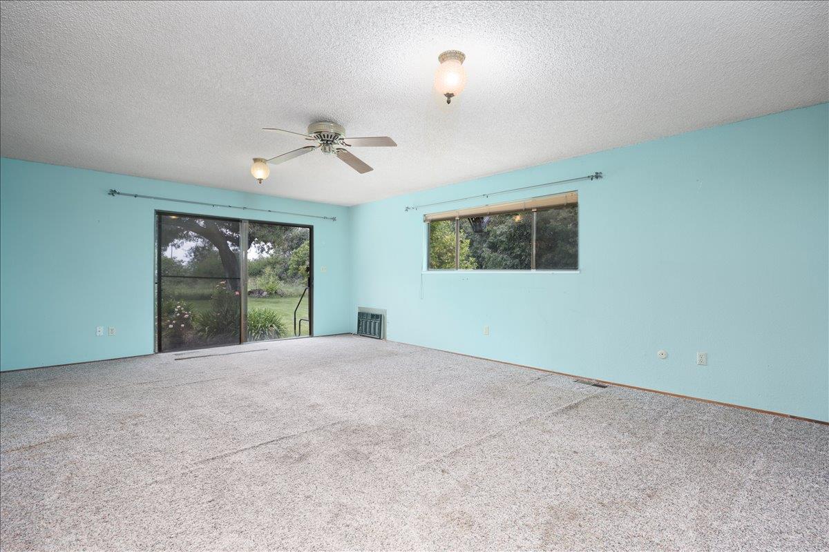 12188 Clay Station Road Herald, CA 95638 - Photo 66 of 89 Master bedroom view to pool and small rose garden