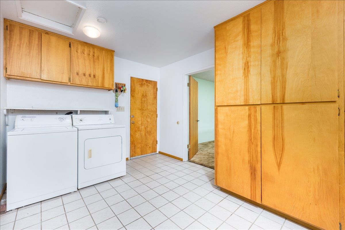 12188 Clay Station Road Herald, CA 95638 - Photo 77 of 89 Laundry room with access to garage and bedroom 5